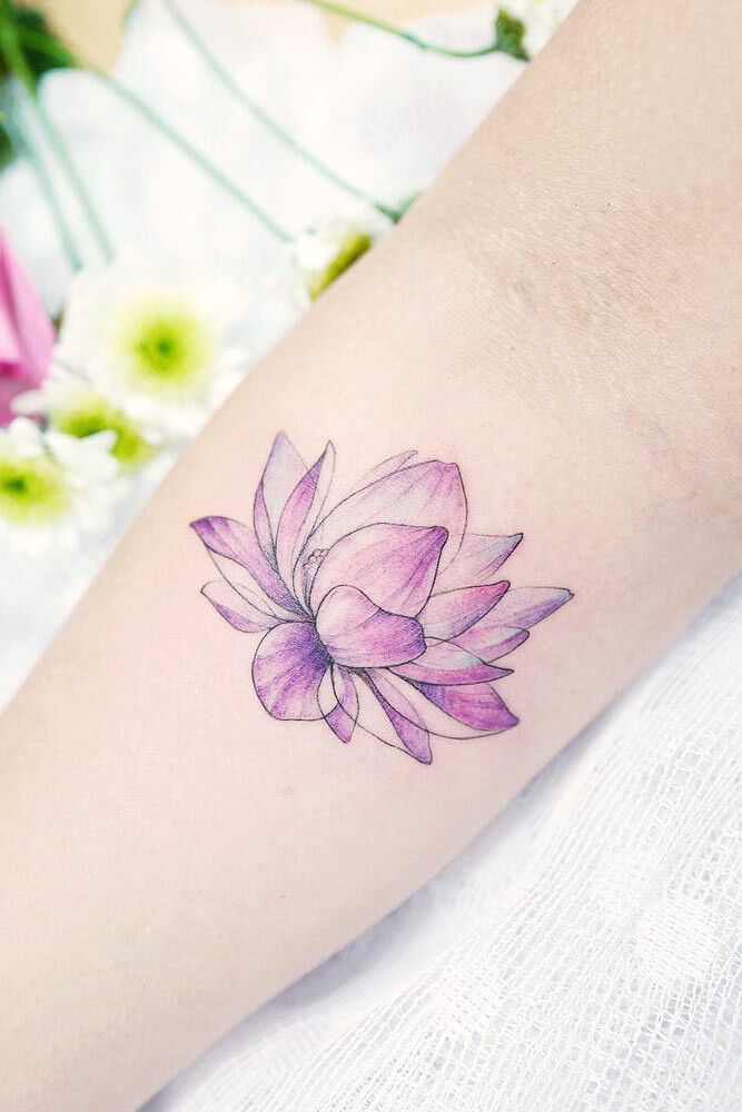 wrist lotus flower tattoo